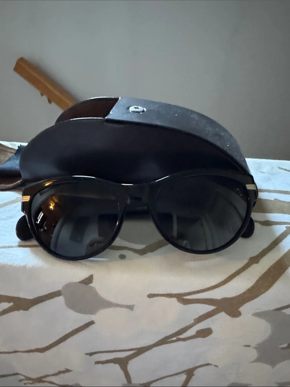 Oliver Peoples Black Sunglasses in Leather Case